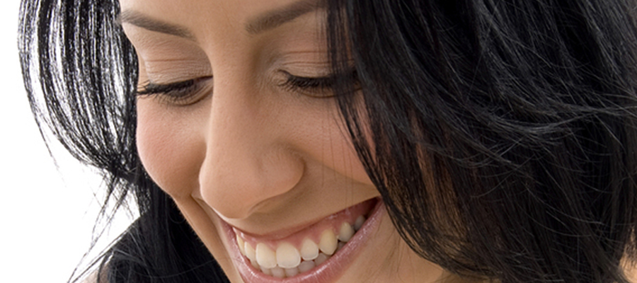 Woman looking down and smiling