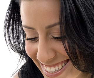 Woman looking down and smiling